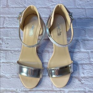 Nude and silver pumps